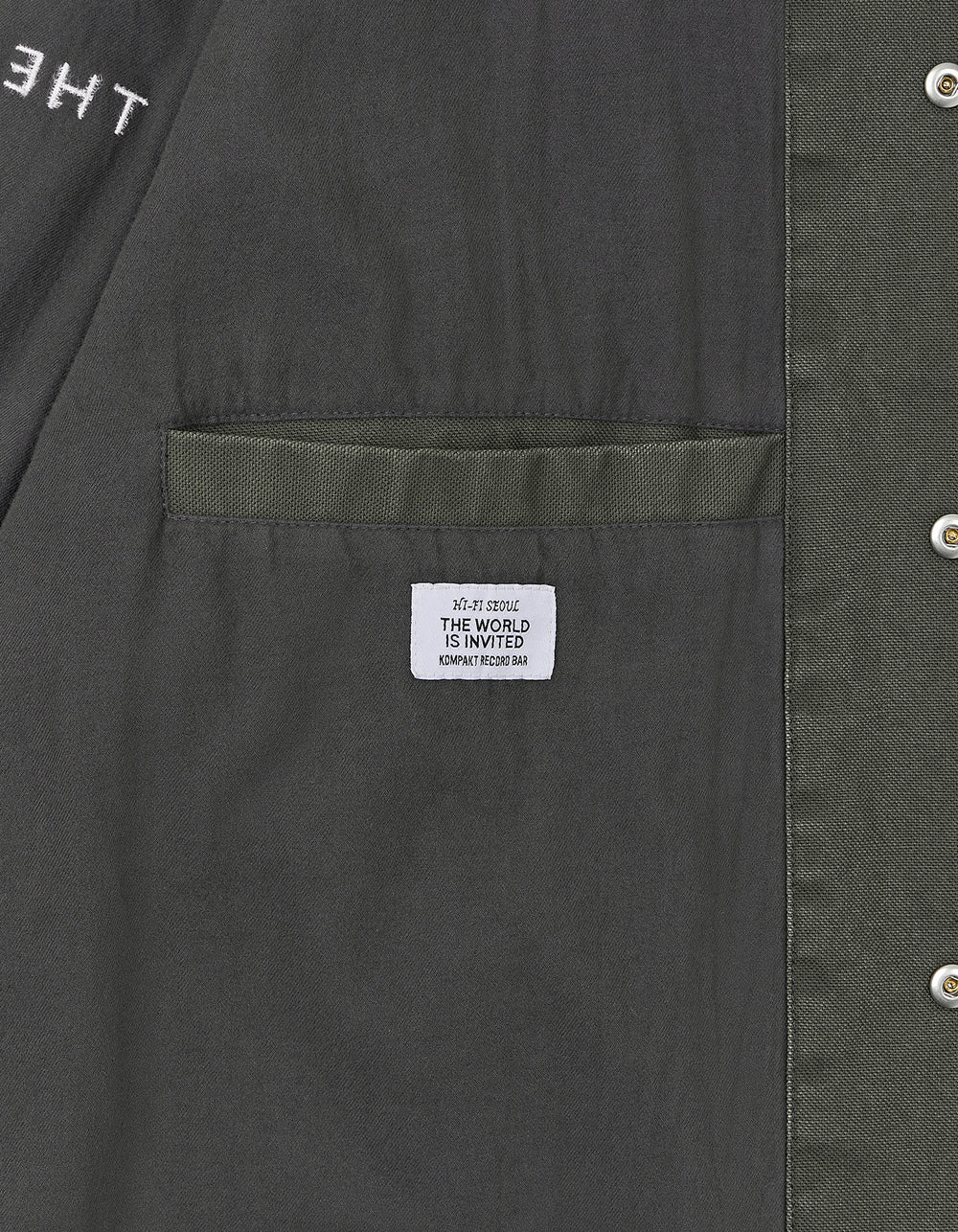 THE WORLD IS INVITED COACH JACKET
