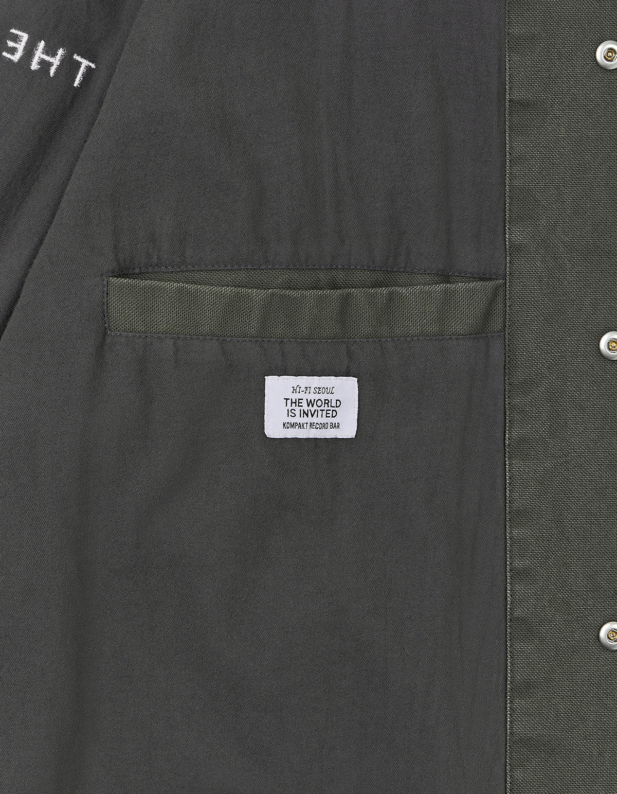 THE WORLD IS INVITED COACH JACKET